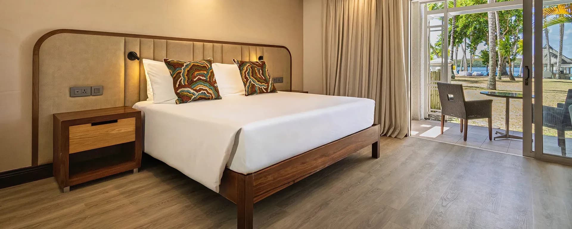 Deluxe Ground Floor Room terrace and garden at Shandrani Beachcomber