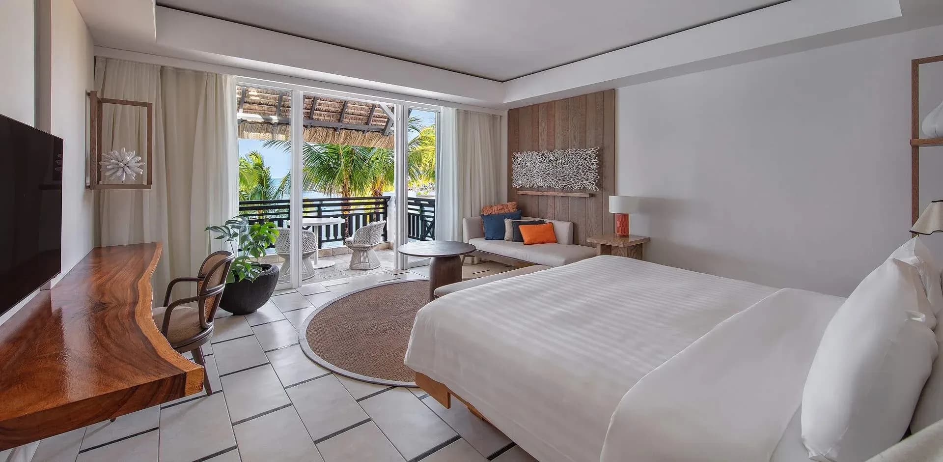 Hibiscus Ocean View Junior Suite king bedroom at Shangri-La Le Touessrok