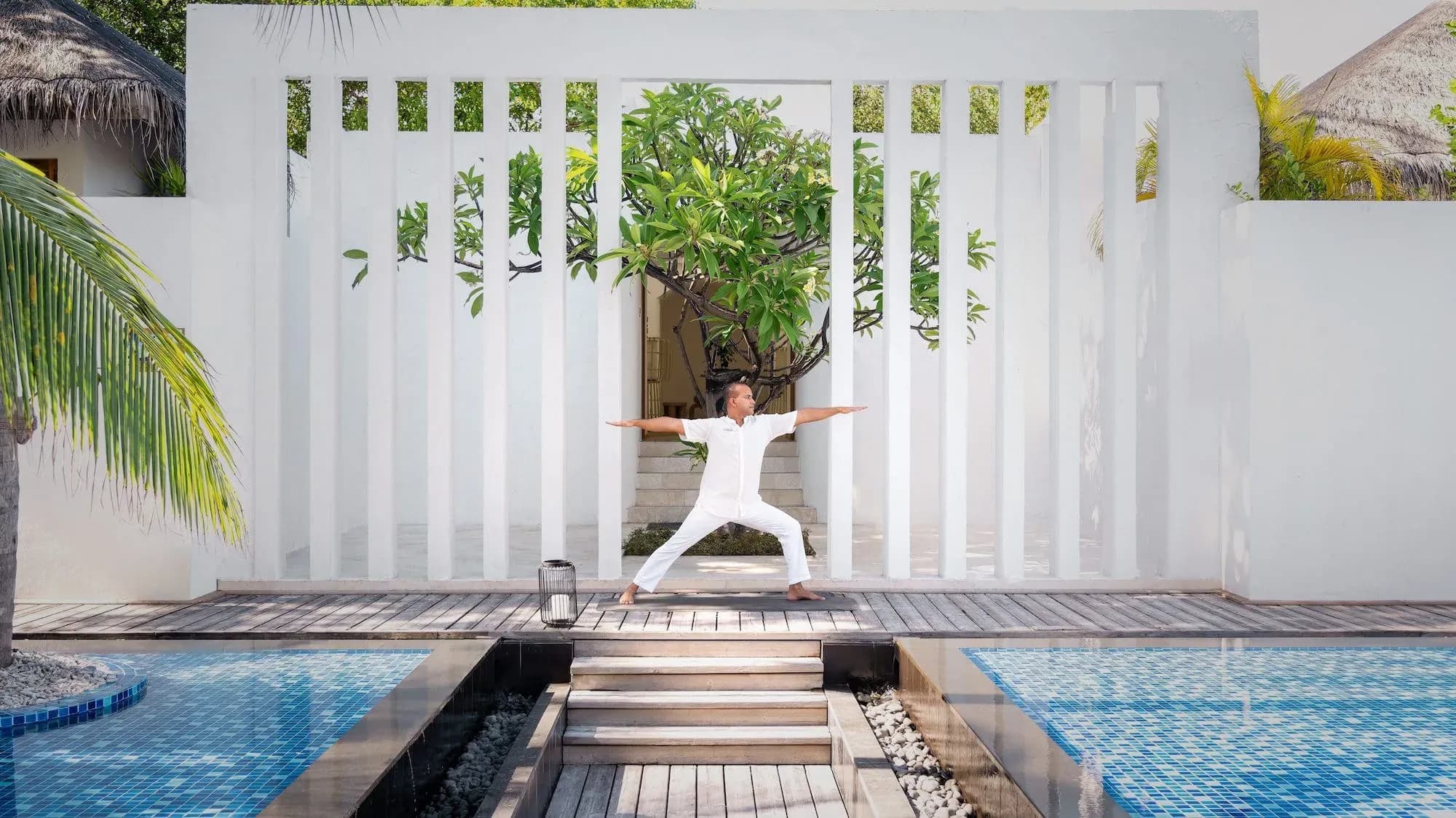 Yoga session beside the pools at Arufen Spa, Sirru Fen Fushi