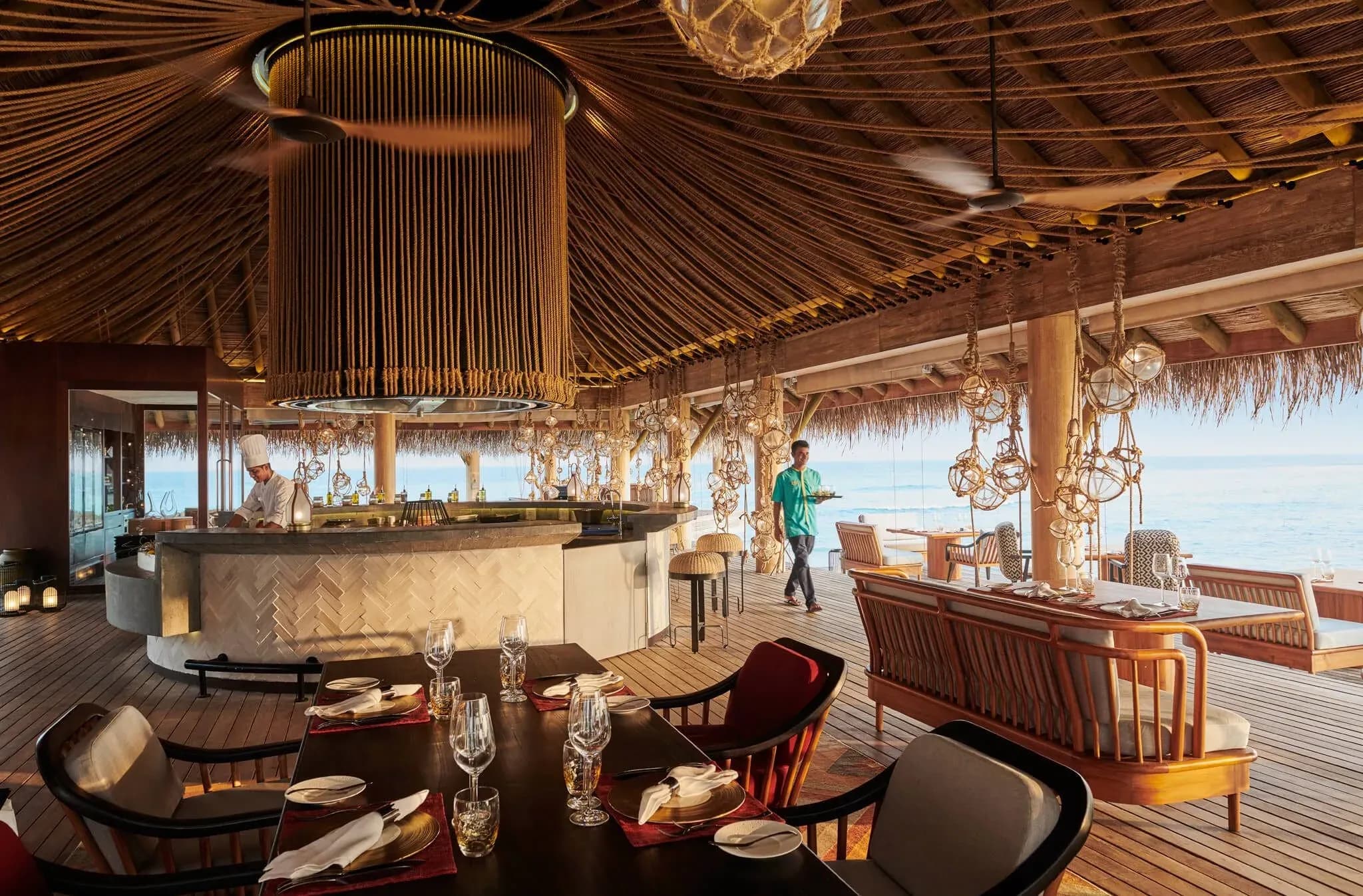 Azure fine-dining restaurant interior over the lagoon at Sirru Fen Fushi