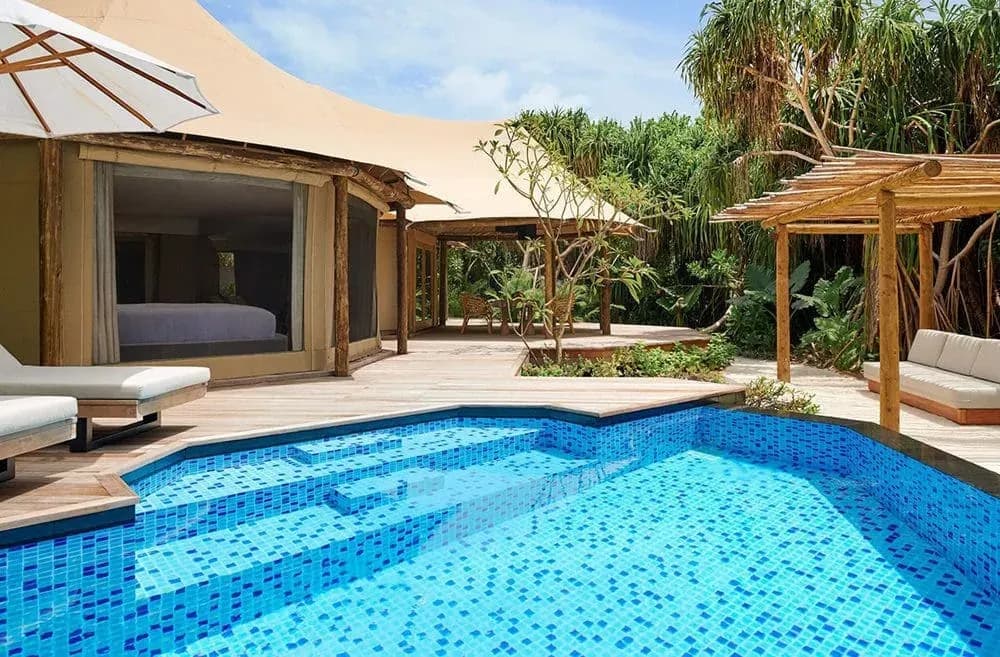 Safari Tented Jungle Villa interior and pool deck at Sirru Fen Fushi