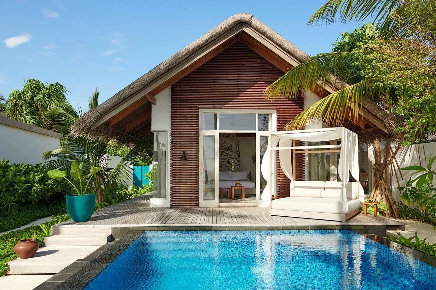 Sunrise Deluxe Beach Villa exterior with private pool at Sirru Fen Fushi