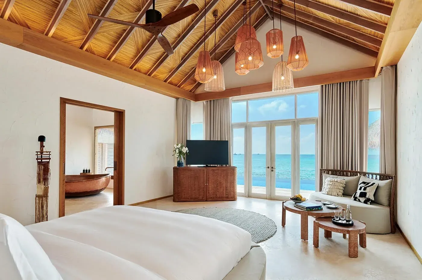 Three Bedroom Sunset Water Villa overwater deck at Sirru Fen Fushi