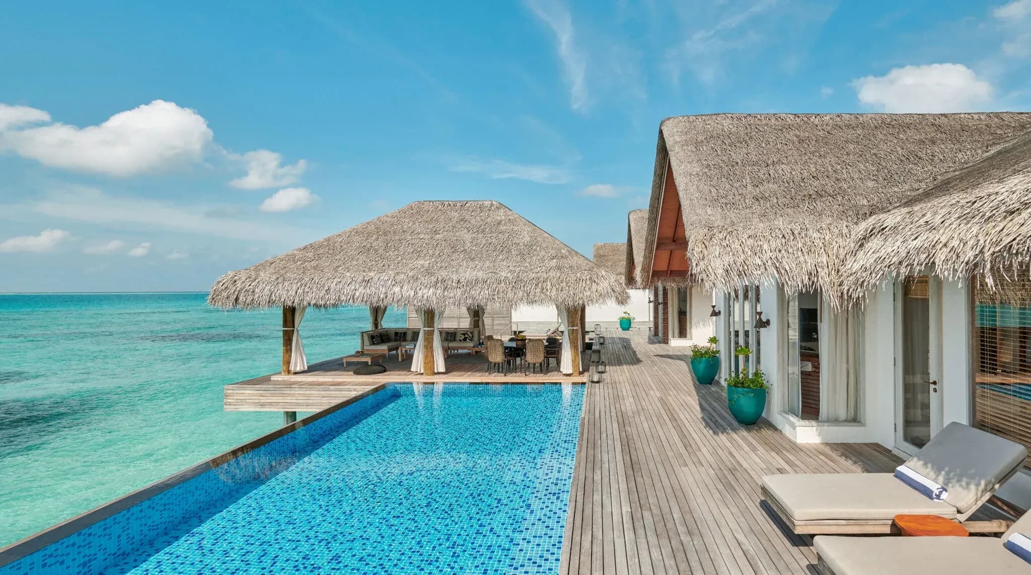 Two Bedroom Sunset Water Villa exterior over the lagoon at Sirru Fen Fushi