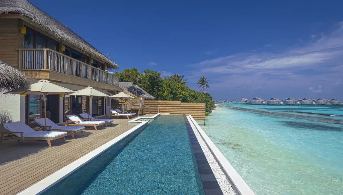 Villa infinity pool over the lagoon at Six Senses Laamu