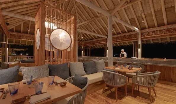 Zen restaurant's overwater dining room at Six Senses Laamu
