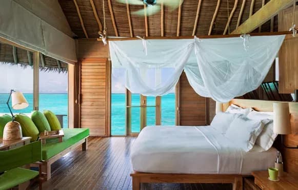 Interior of the Ocean Water Villa at Six Senses Laamu, facing the open ocean