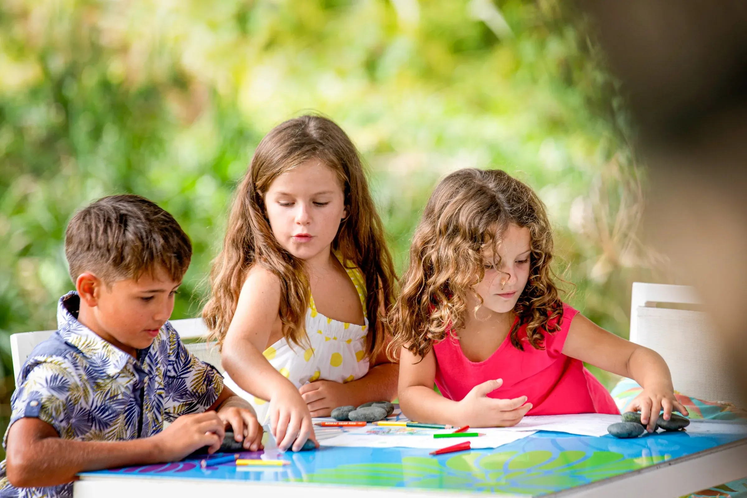 Children doing arts and crafts at Le Petit Prince Kids Villa, Sofitel Mauritius L'Impérial Resort & Spa