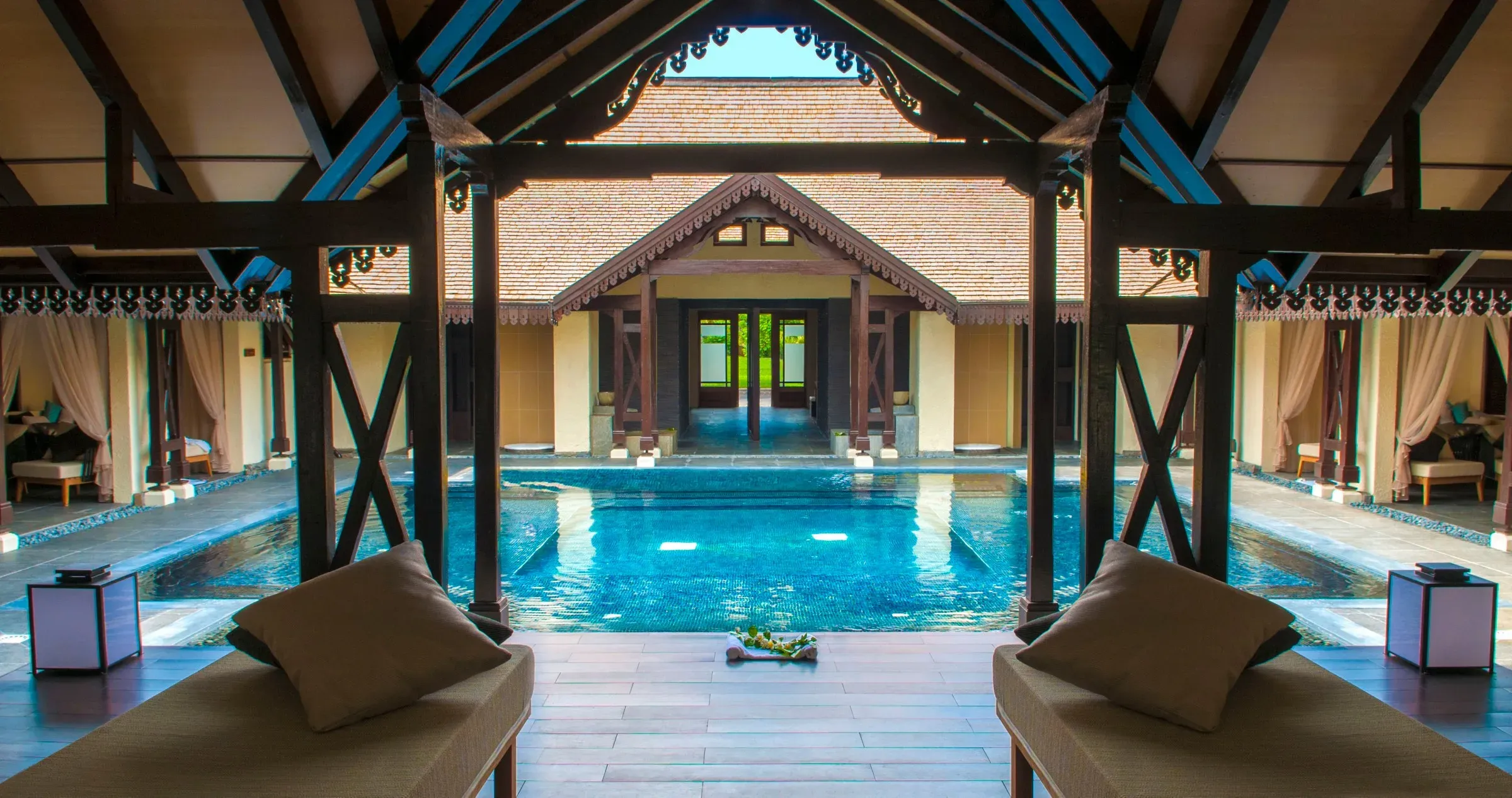 Sofitel Spa indoor pool corridor with treatment pavilions at Sofitel Mauritius L'Impérial Resort & Spa