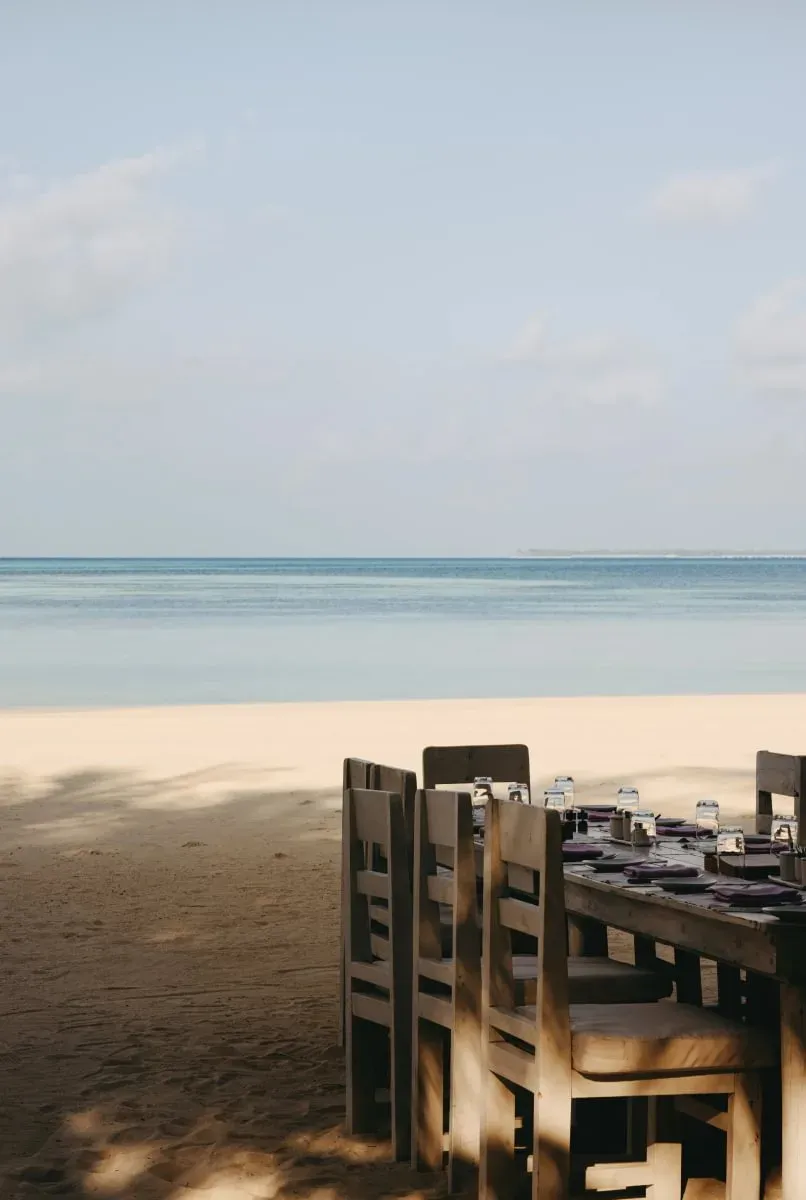 Waterfront dining setting at Chill, Soneva Jani
