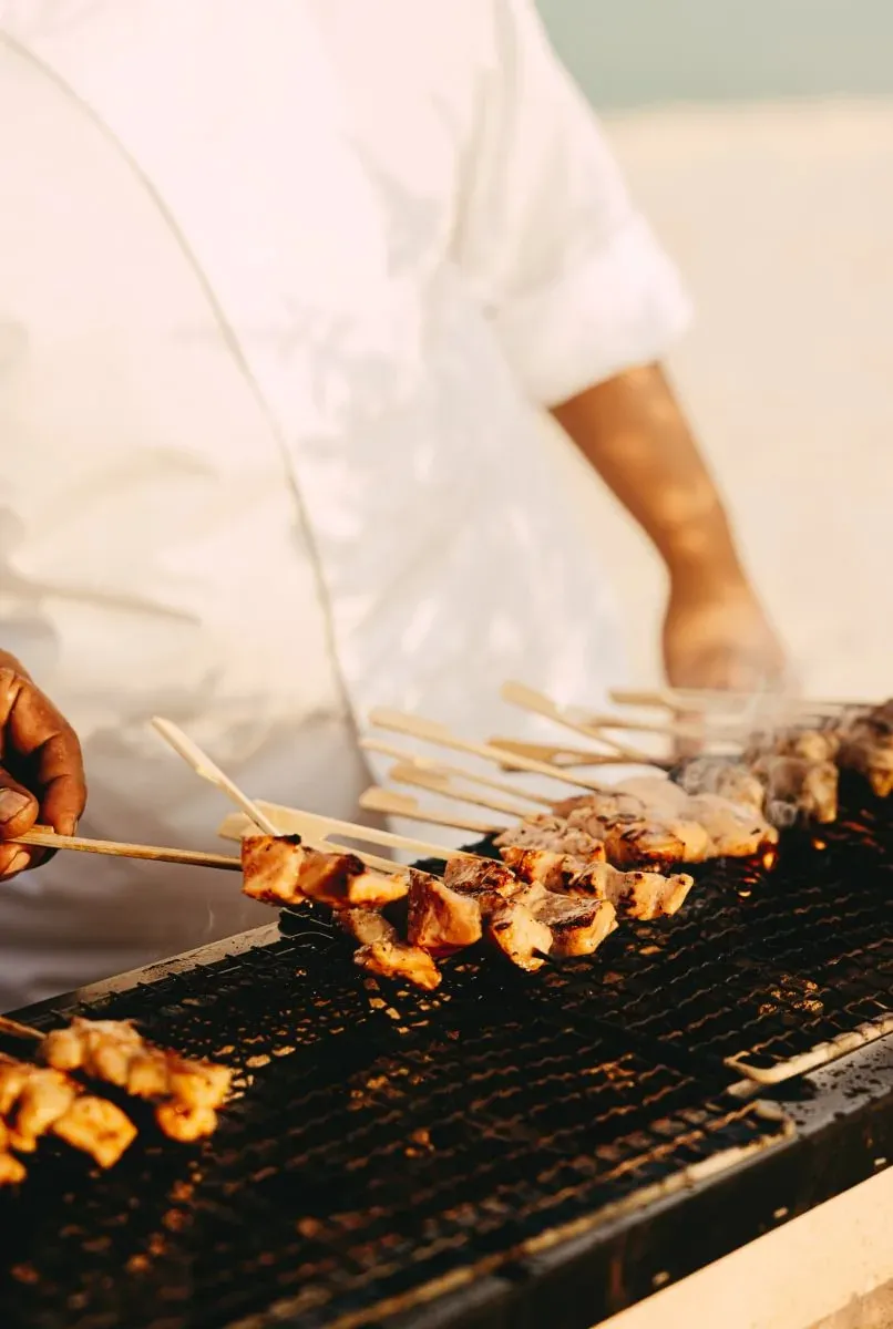 Charcoal-hearth dining scene at Irori Grill at Director's Cut, Soneva Jani