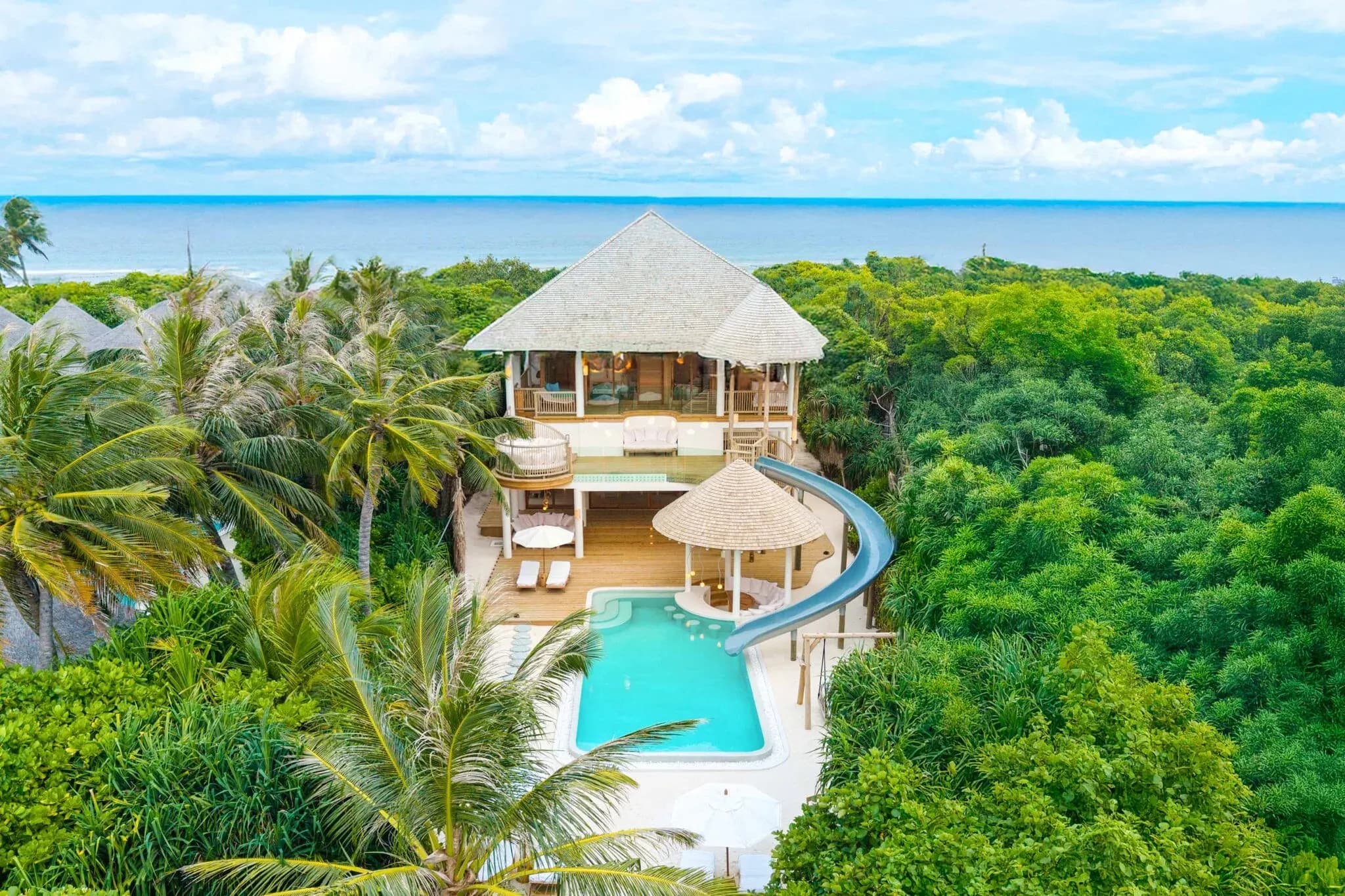 3 Bedroom Island Retreat with Slide, Villa 29, framed by lagoon views at Soneva Jani