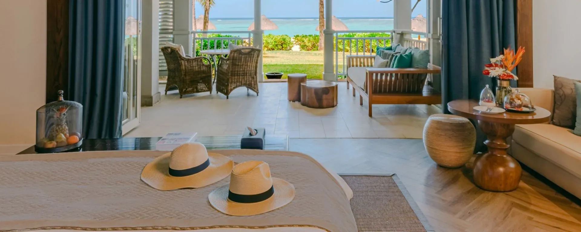 Beachfront terrace and sun loungers at The St. Regis Le Morne Resort, Mauritius