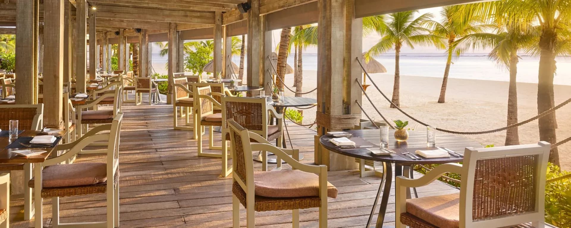 The Boathouse Beach Grill seaside dining terrace at The St. Regis Le Morne Resort, Mauritius