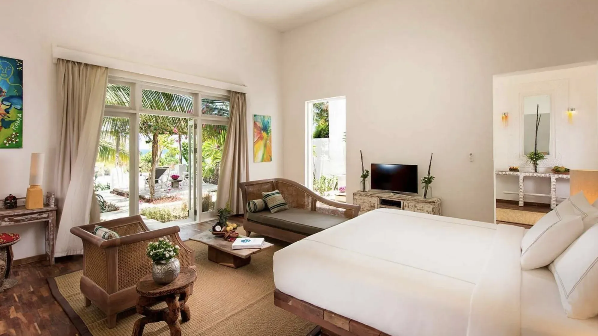 Prestige Villa bedroom with local artwork at The Aiyana, Pemba Island