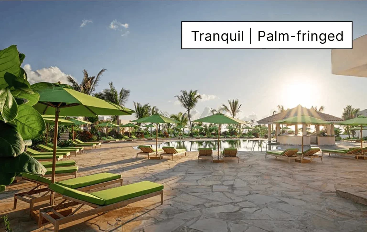 Rooftop lounge terrace at Muyuni Beach Club, The Mora Zanzibar, at sunset