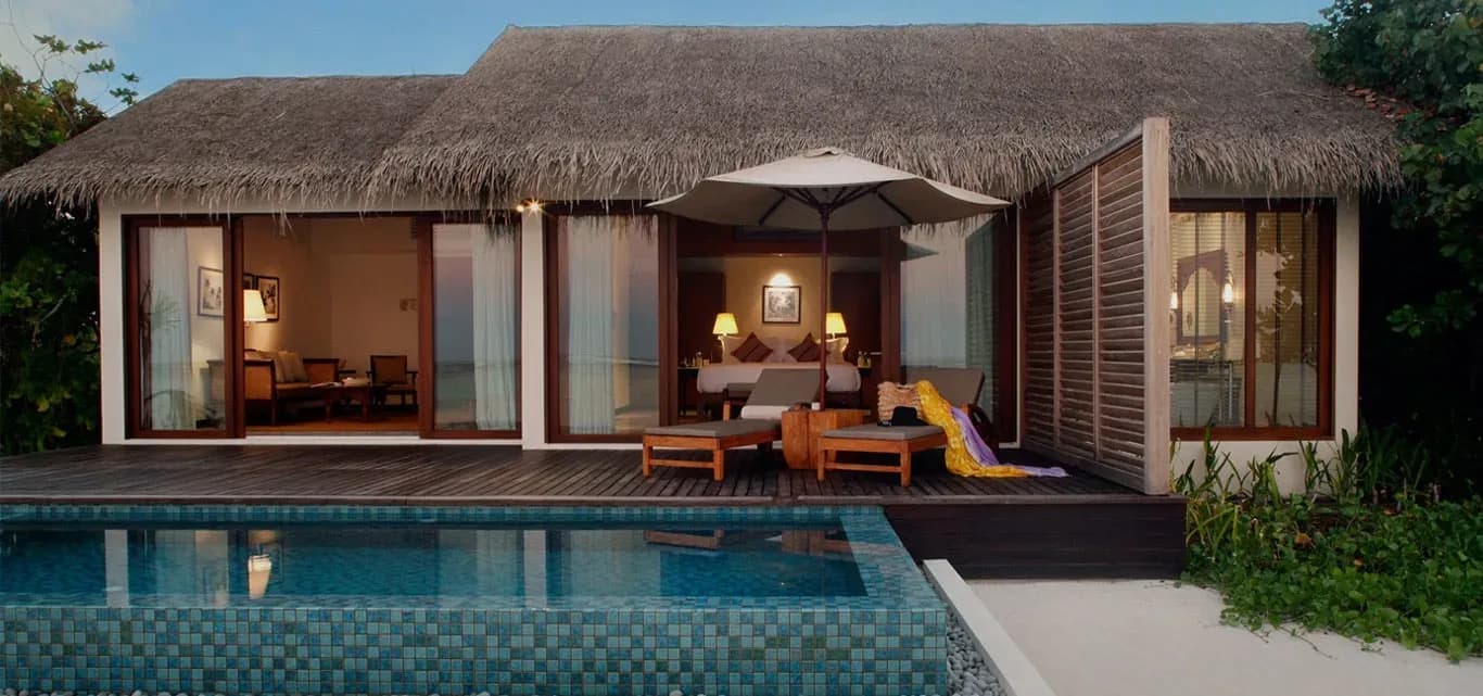 Beach Pool Villa terrace and private pool at dusk, The Residence Maldives at Falhumaafushi