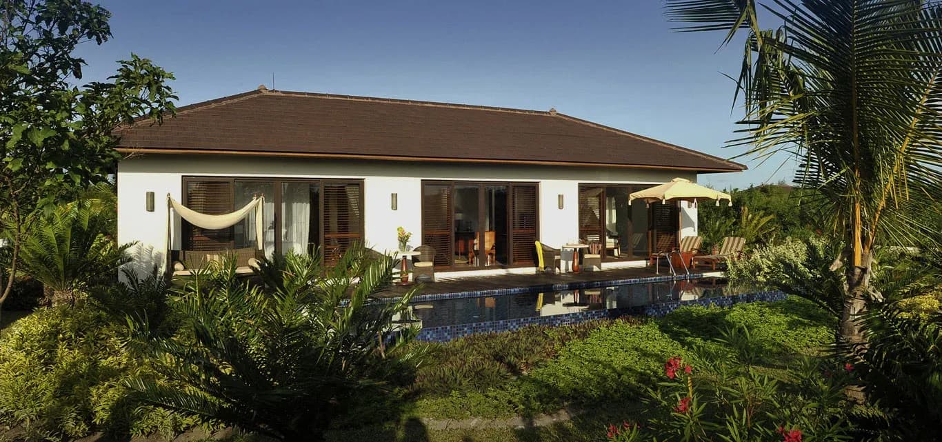 Frangipani Garden Pool Villa two-bedroom exterior and private pool at The Residence Zanzibar