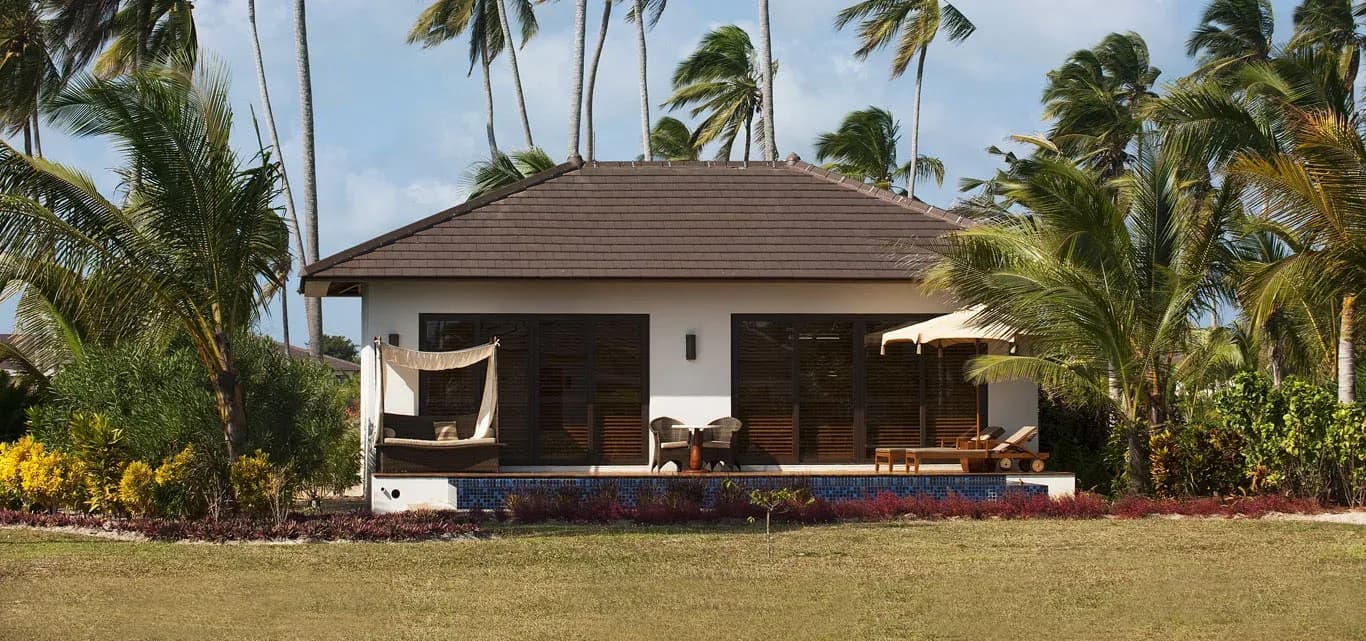 Luxury Garden Pool Villa exterior with private pool set among palm trees, The Residence Zanzibar