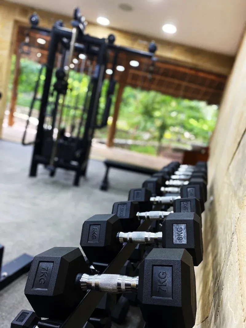 Free weights and cable machine in the open-air gym at Tulia Zanzibar