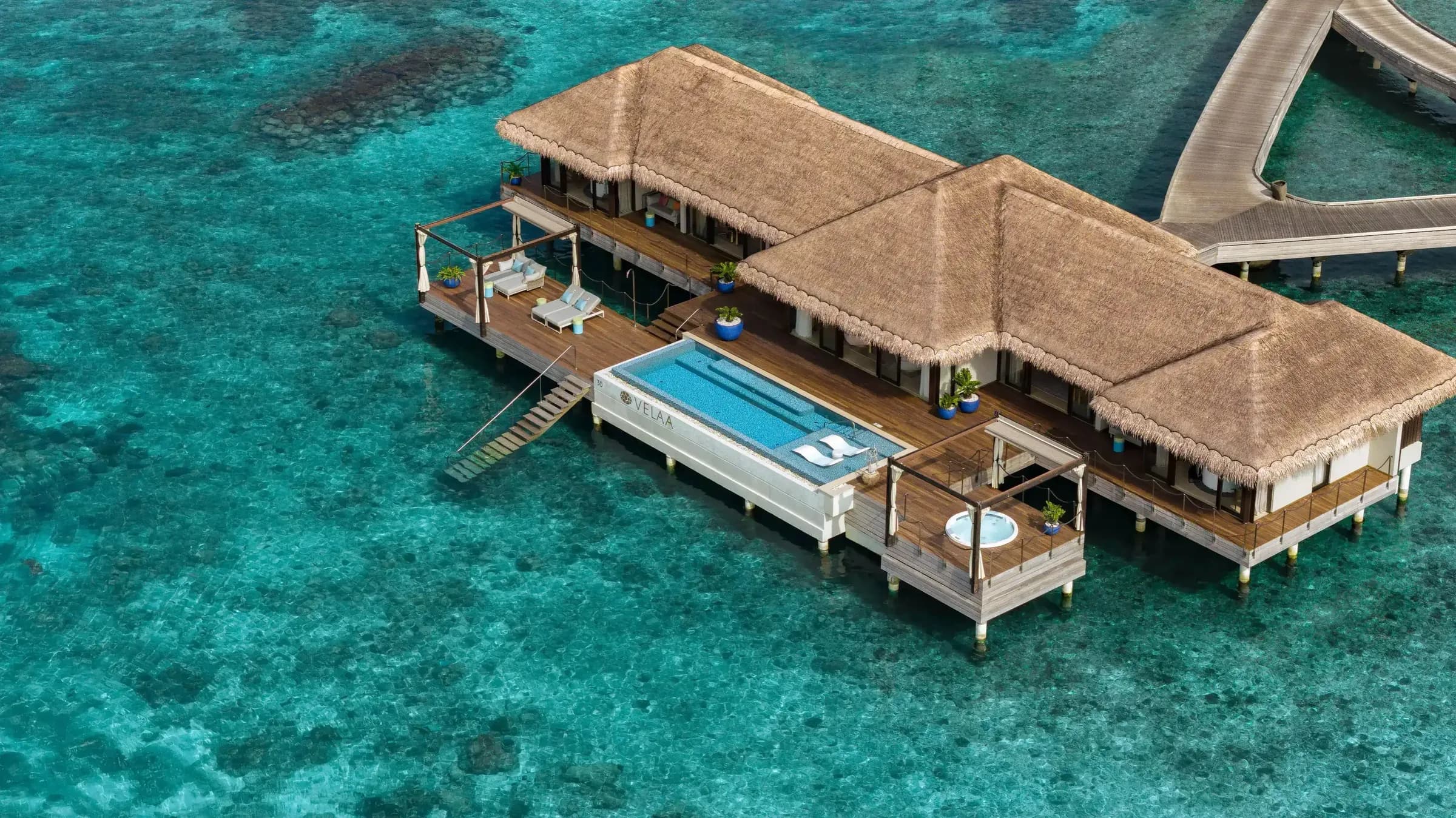 Ocean Pool House terrace with private pool and lagoon steps at Velaa Private Island