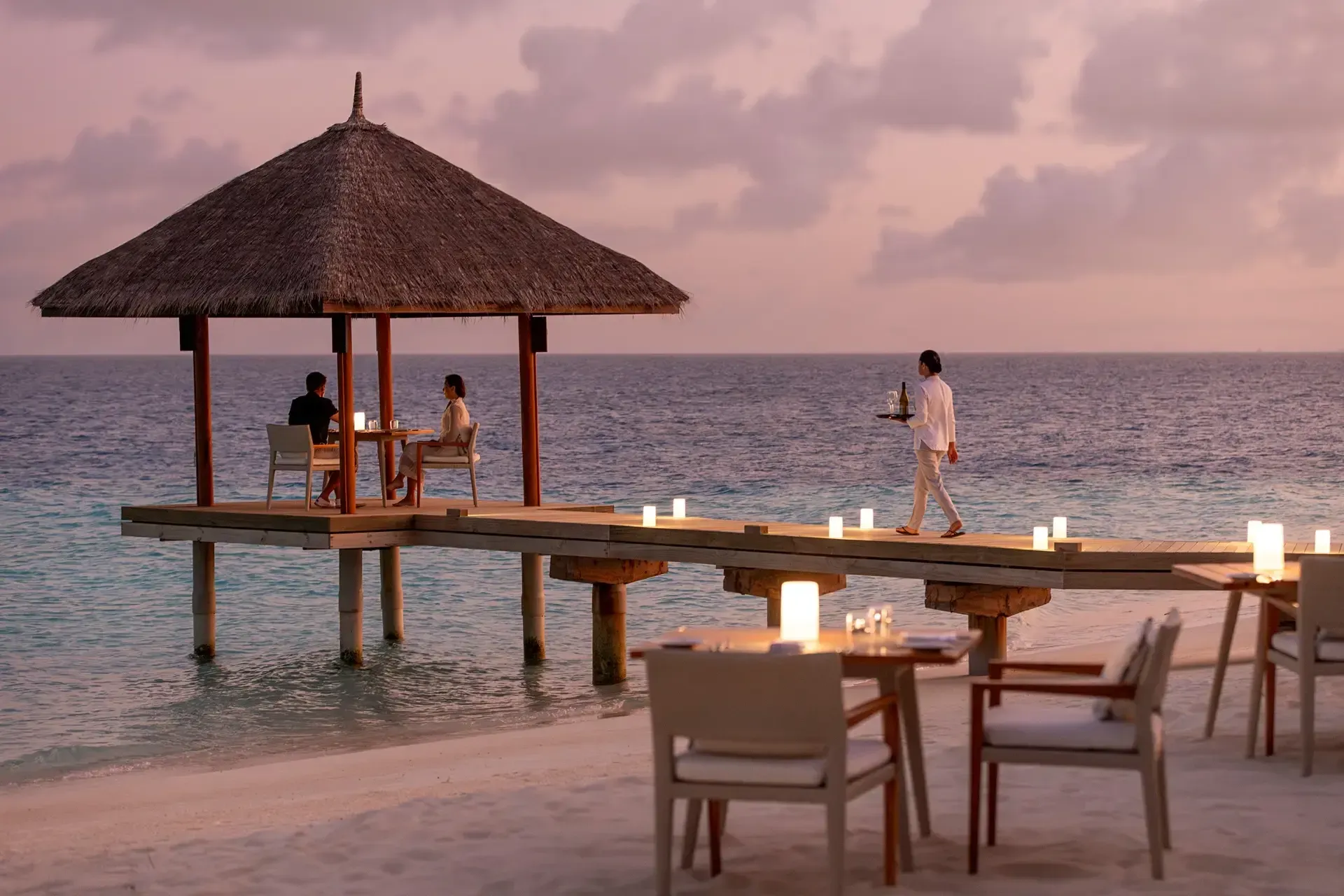 Sand beachfront cabana dining at Niva Velassaru Maldives