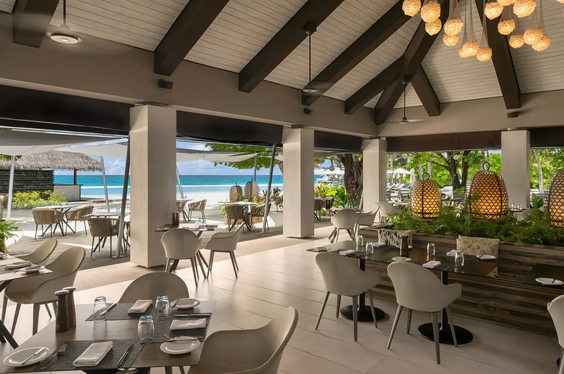 Turquoise beachside restaurant overview at Niva Velassaru Maldives
