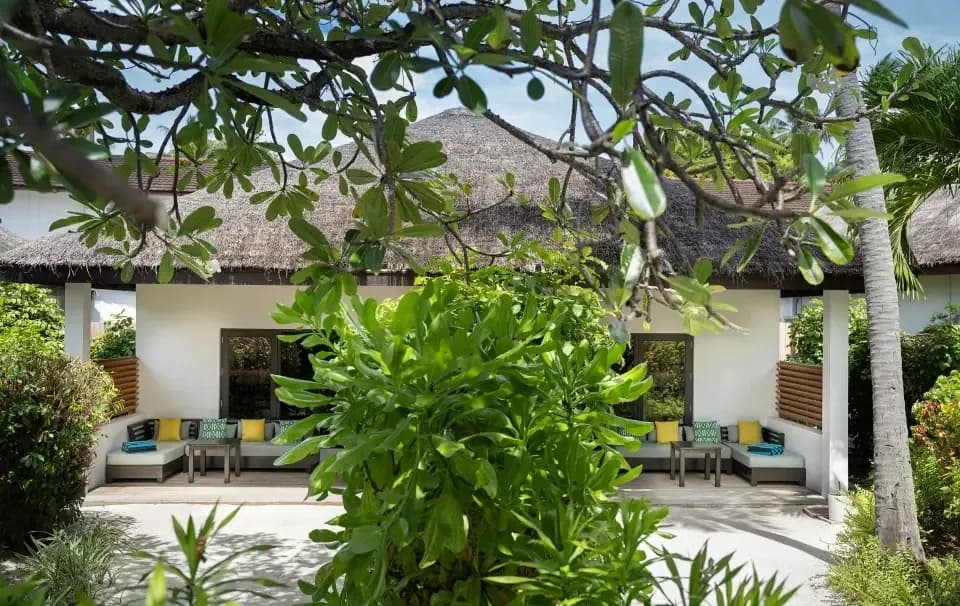 Two Bedroom Deluxe Villa exterior garden setting at Niva Velassaru Maldives
