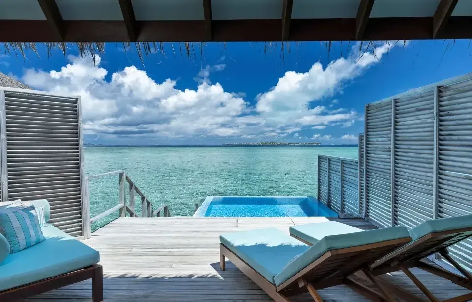 Water Bungalow with Pool sundeck and plunge pool over the lagoon at Niva Velassaru Maldives