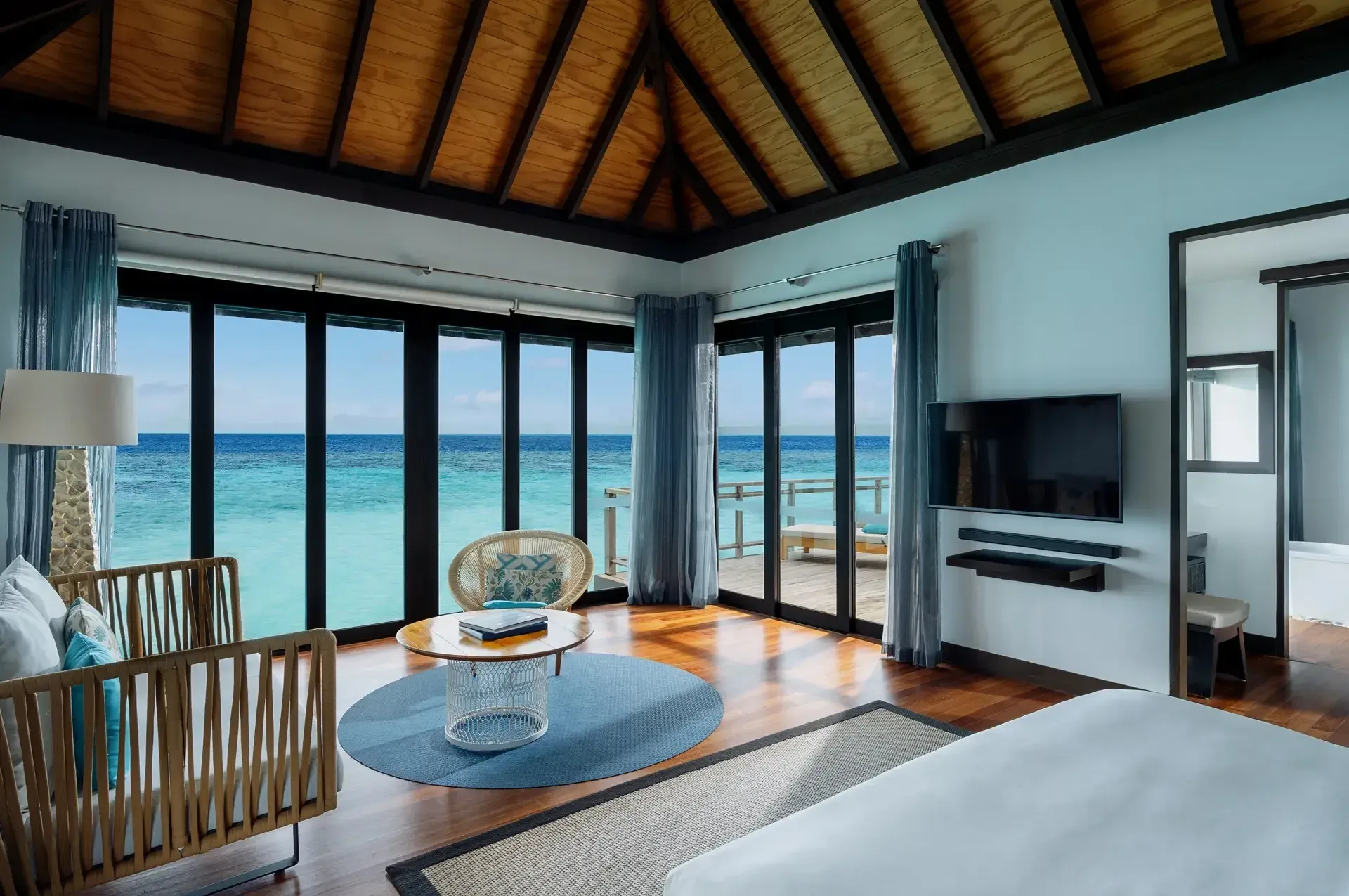 Water Villa overwater deck with lagoon views at Niva Velassaru Maldives