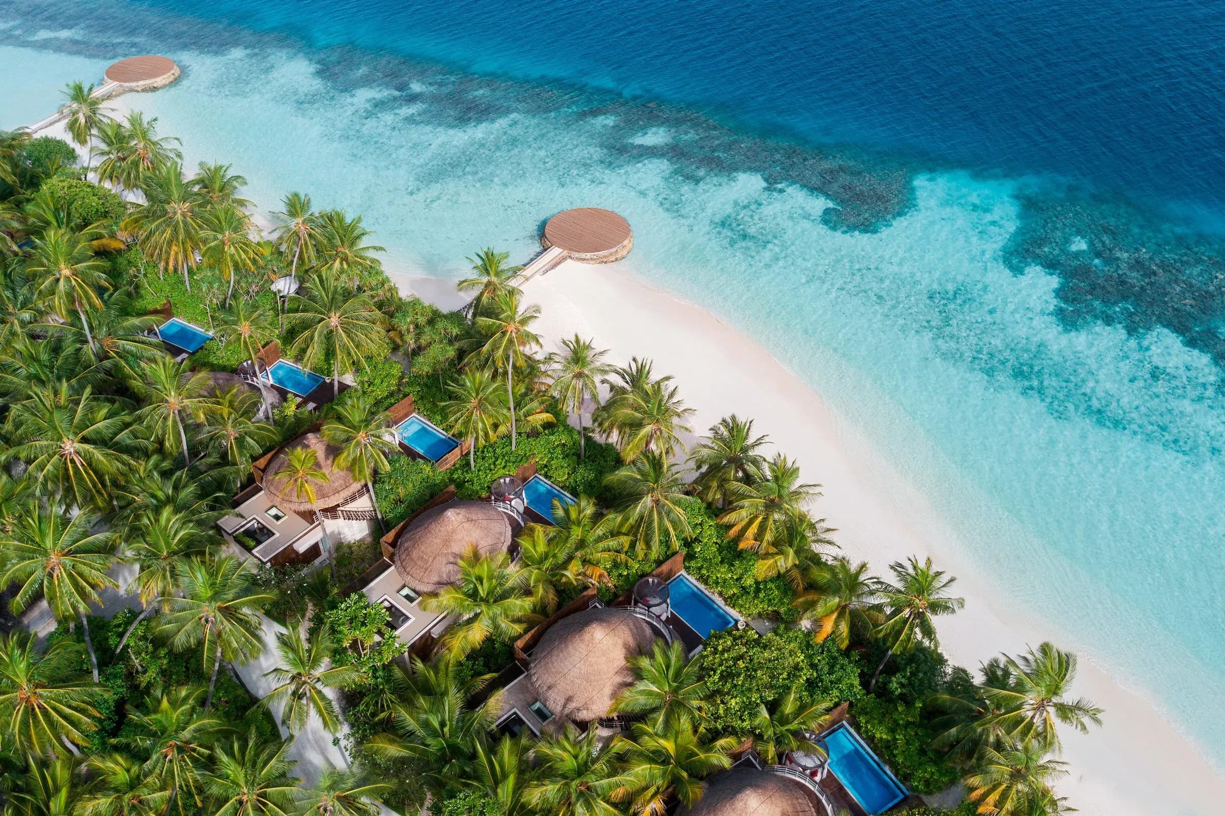 Aerial view of an Escape Beach Villa with private pool at W Maldives