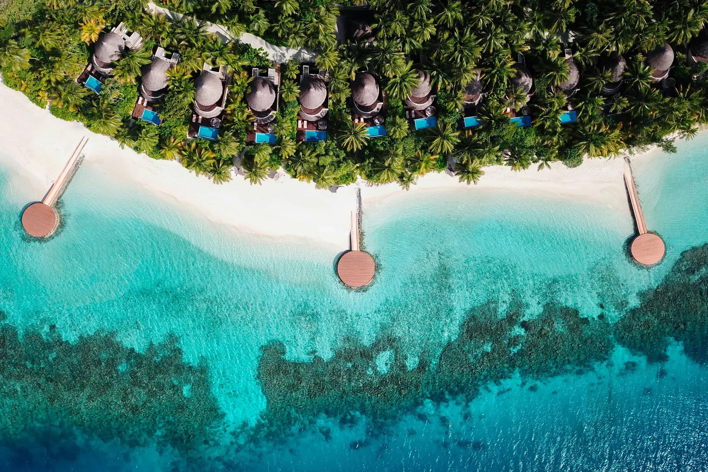 Aerial view of the Oasis Beach Villa with Slide, a two-bedroom beach villa at W Maldives