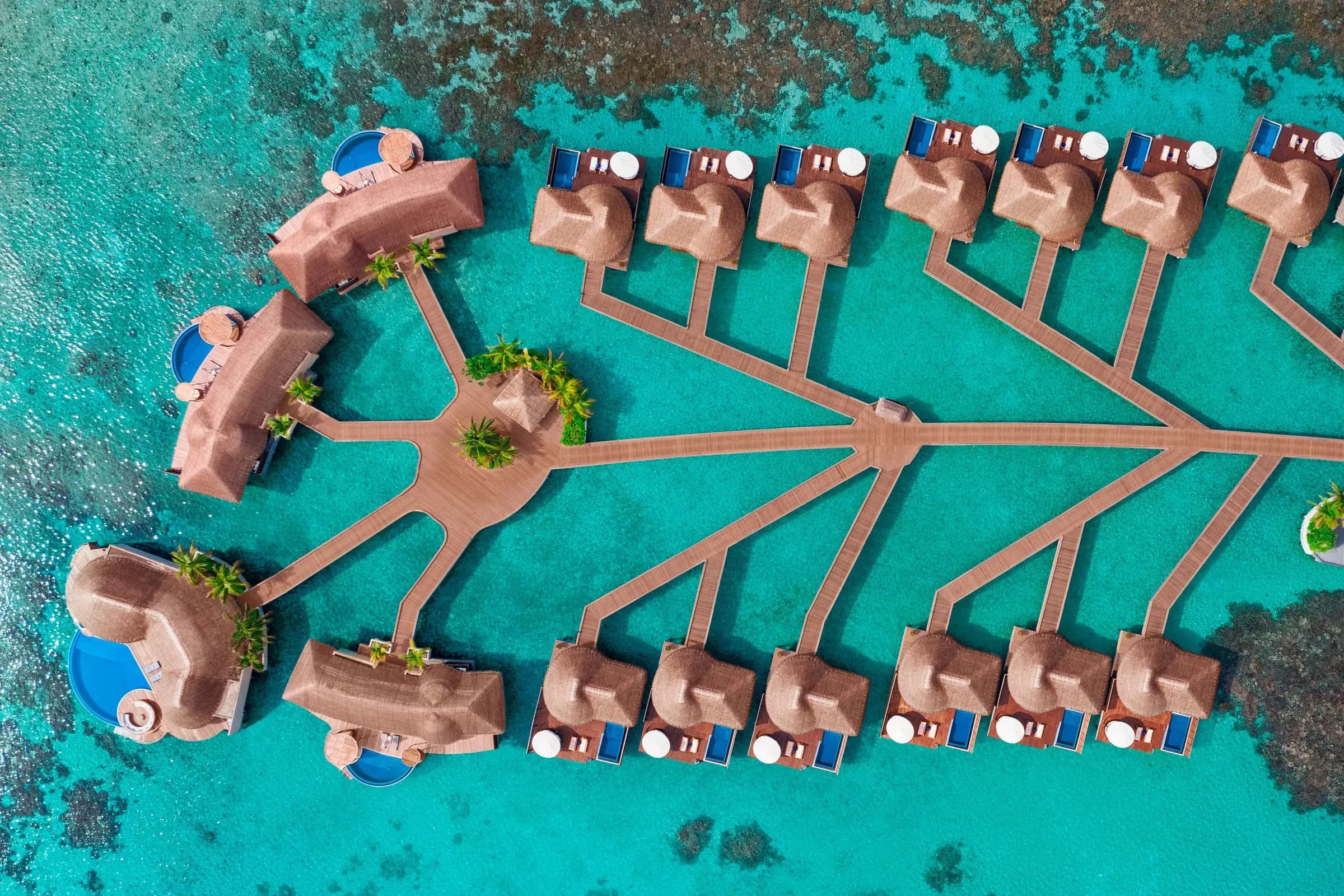 Aerial view of a Superior Overwater Villa with private pool at W Maldives