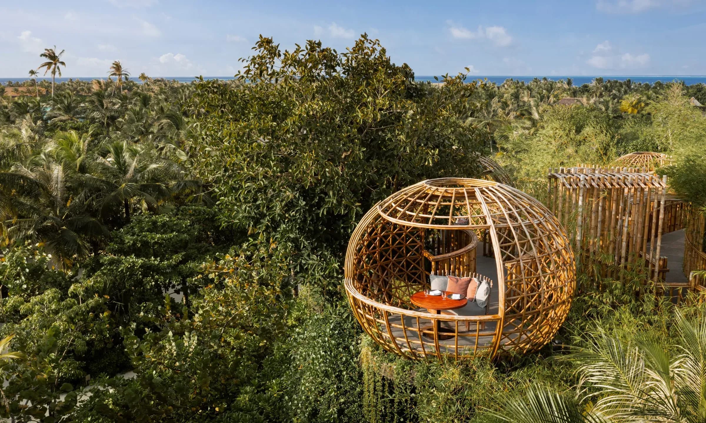 Aerial view of Terra, the treetop dining venue at Waldorf Astoria Maldives Ithaafushi
