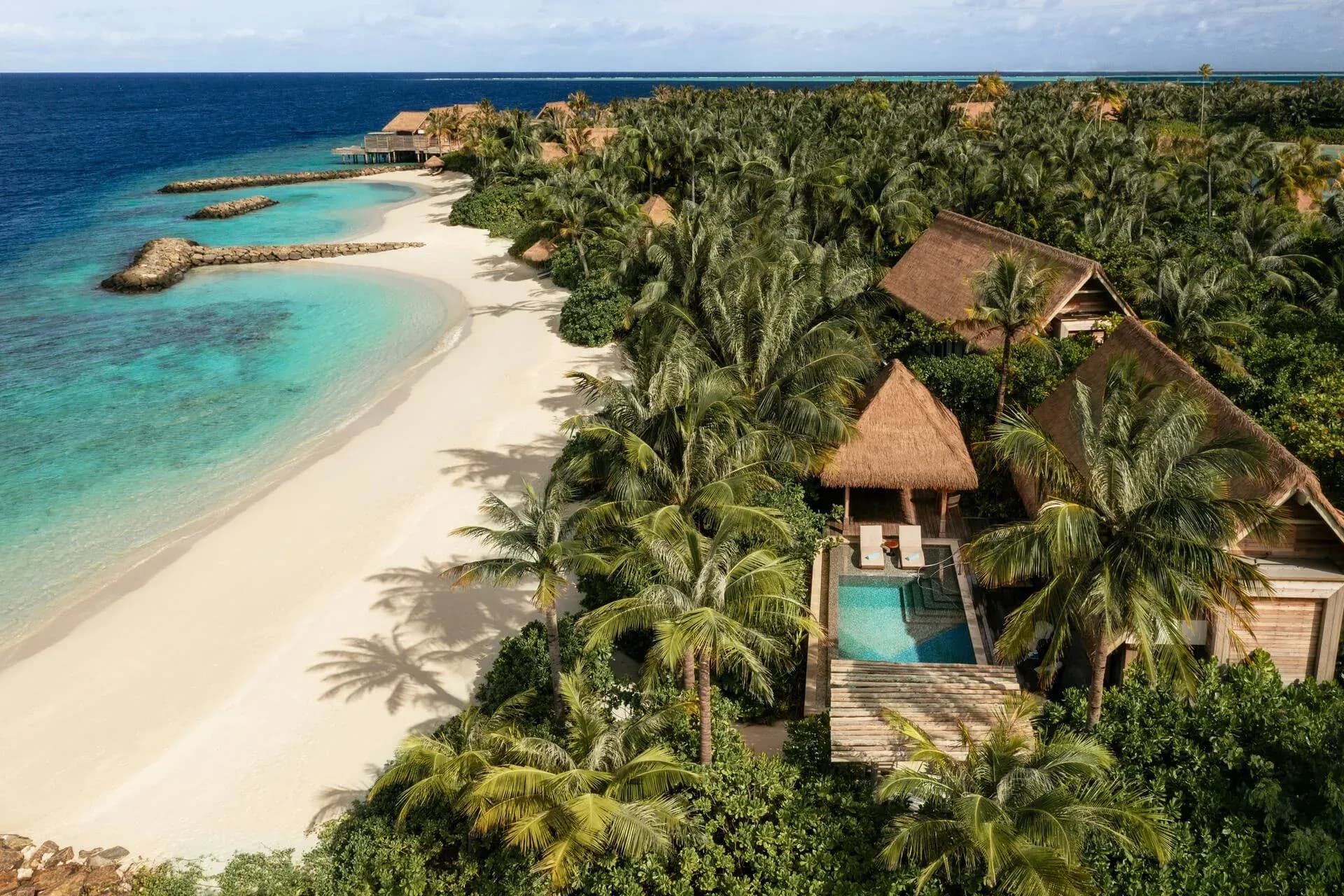 Aerial view of a King Beach Villa with private pool and garden at Waldorf Astoria Maldives Ithaafushi