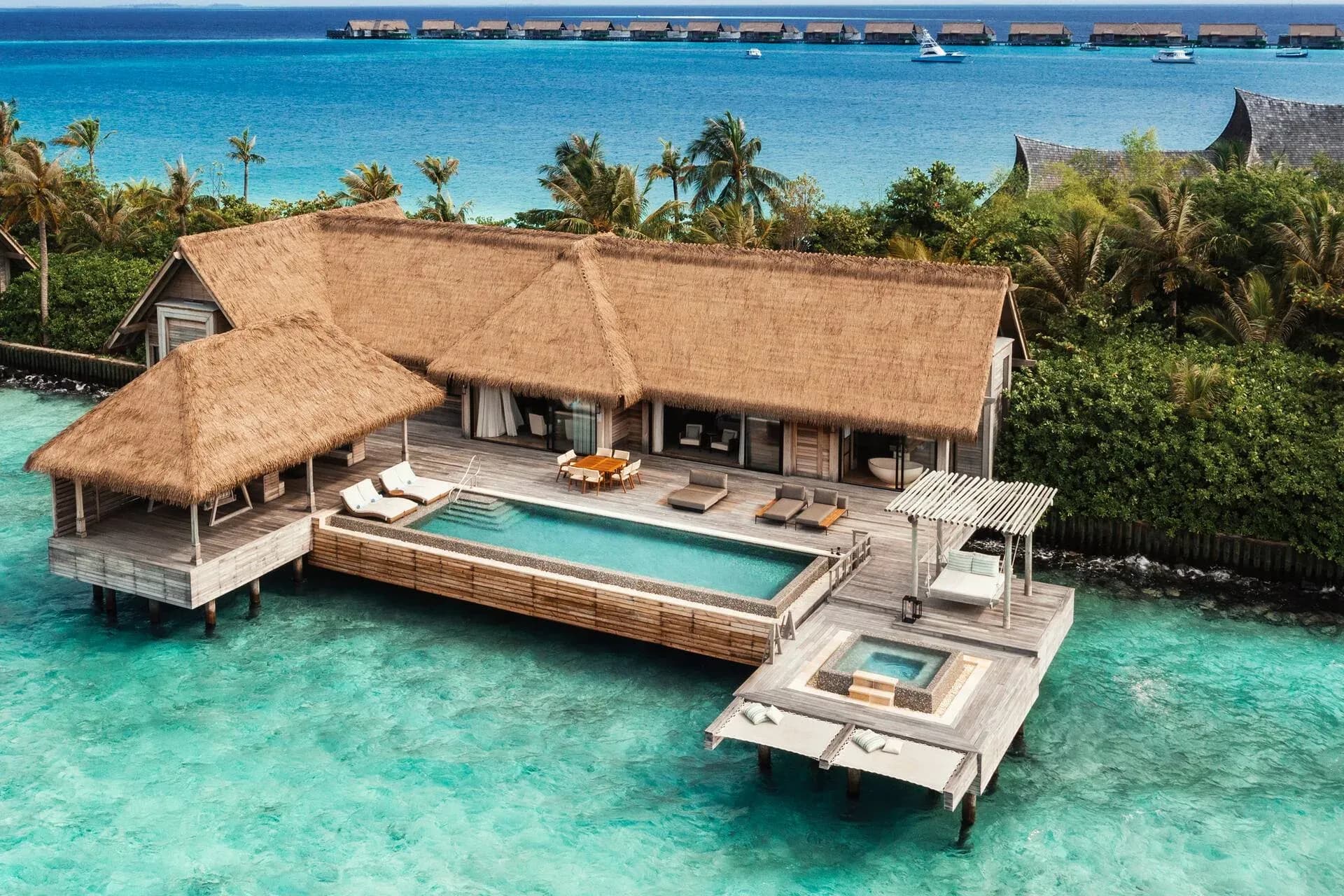 Aerial view of a Two Bedroom Reef Villa with pool at Waldorf Astoria Maldives Ithaafushi