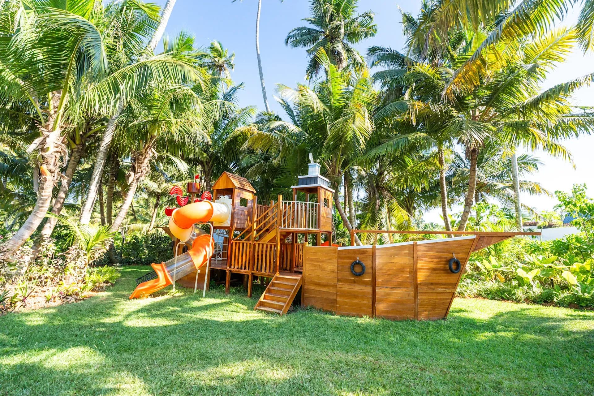 Ship-shaped kids club play structure in the garden