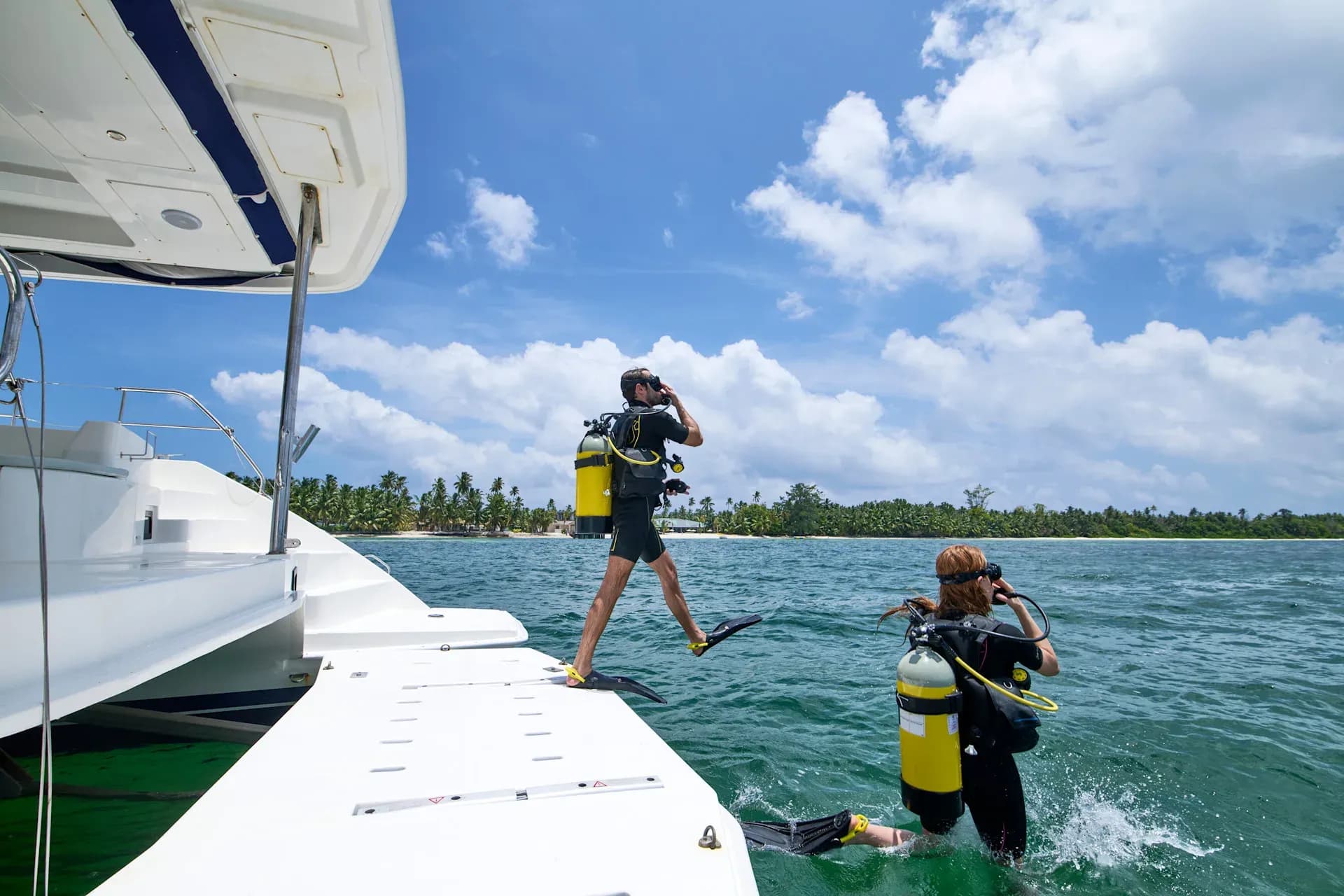 Guests diving and snorkelling in the waters around Platte Island
