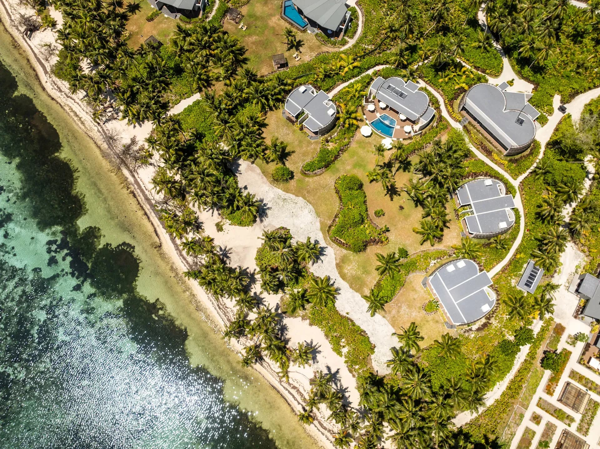 Aerial view of Platte Island's coastline and resort villas