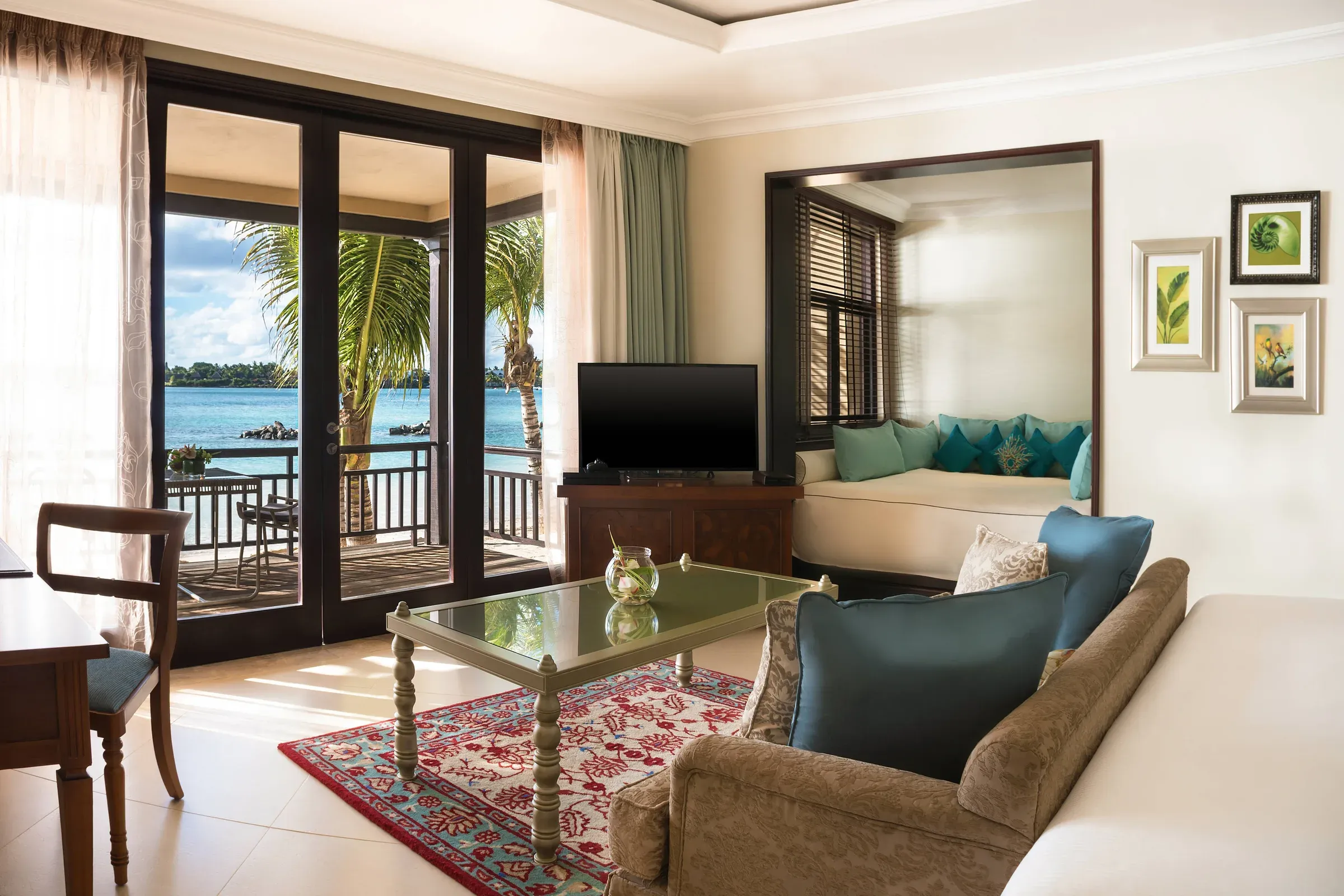 Deluxe Family Room bed and artwork at The Westin Turtle Bay Resort & Spa, Mauritius