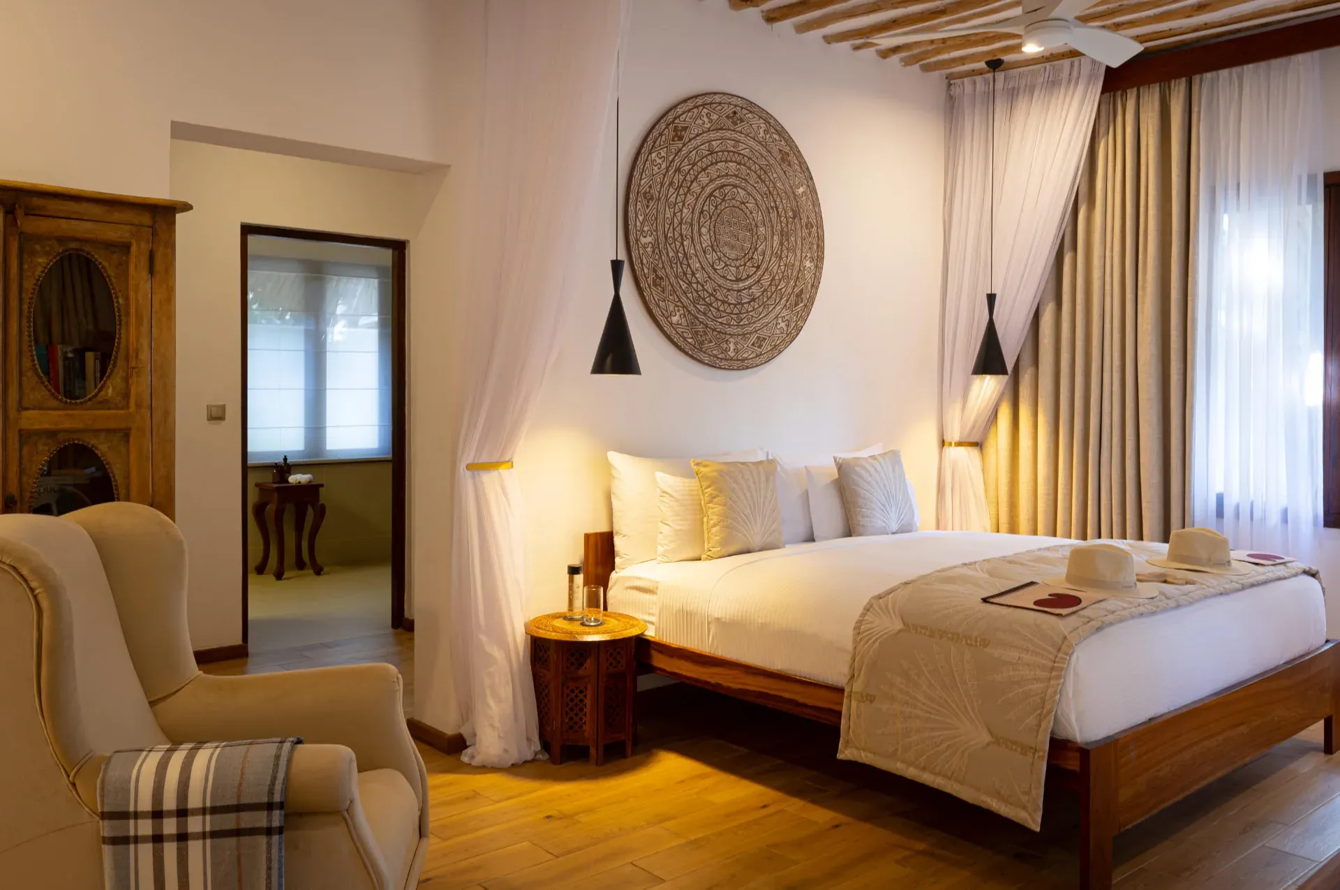 Cinnamon Double Room bedroom with king-size bed at White Sand Luxury Villas & Spa