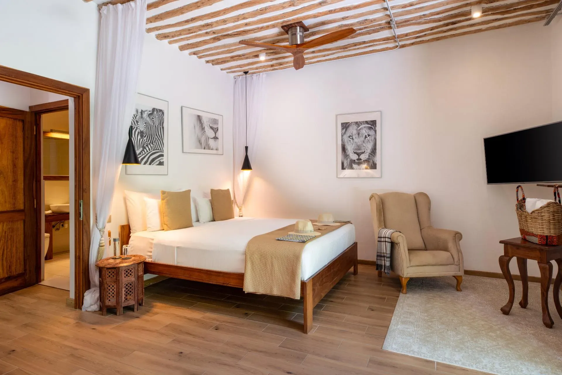Cinnamon Quadruple Room with king and twin beds at White Sand Luxury Villas & Spa