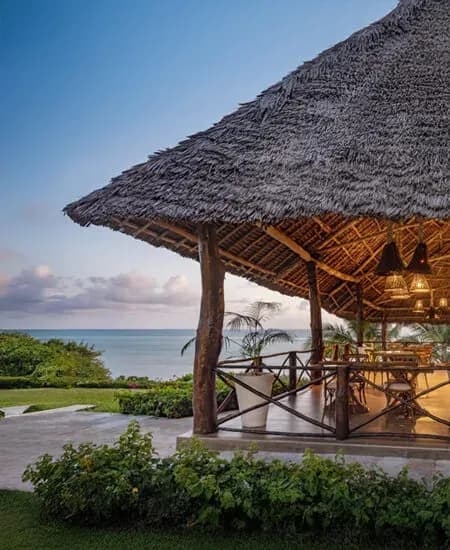 Thatched pavilion at sunset overlooking the Indian Ocean at Zawadi Hotel Zanzibar